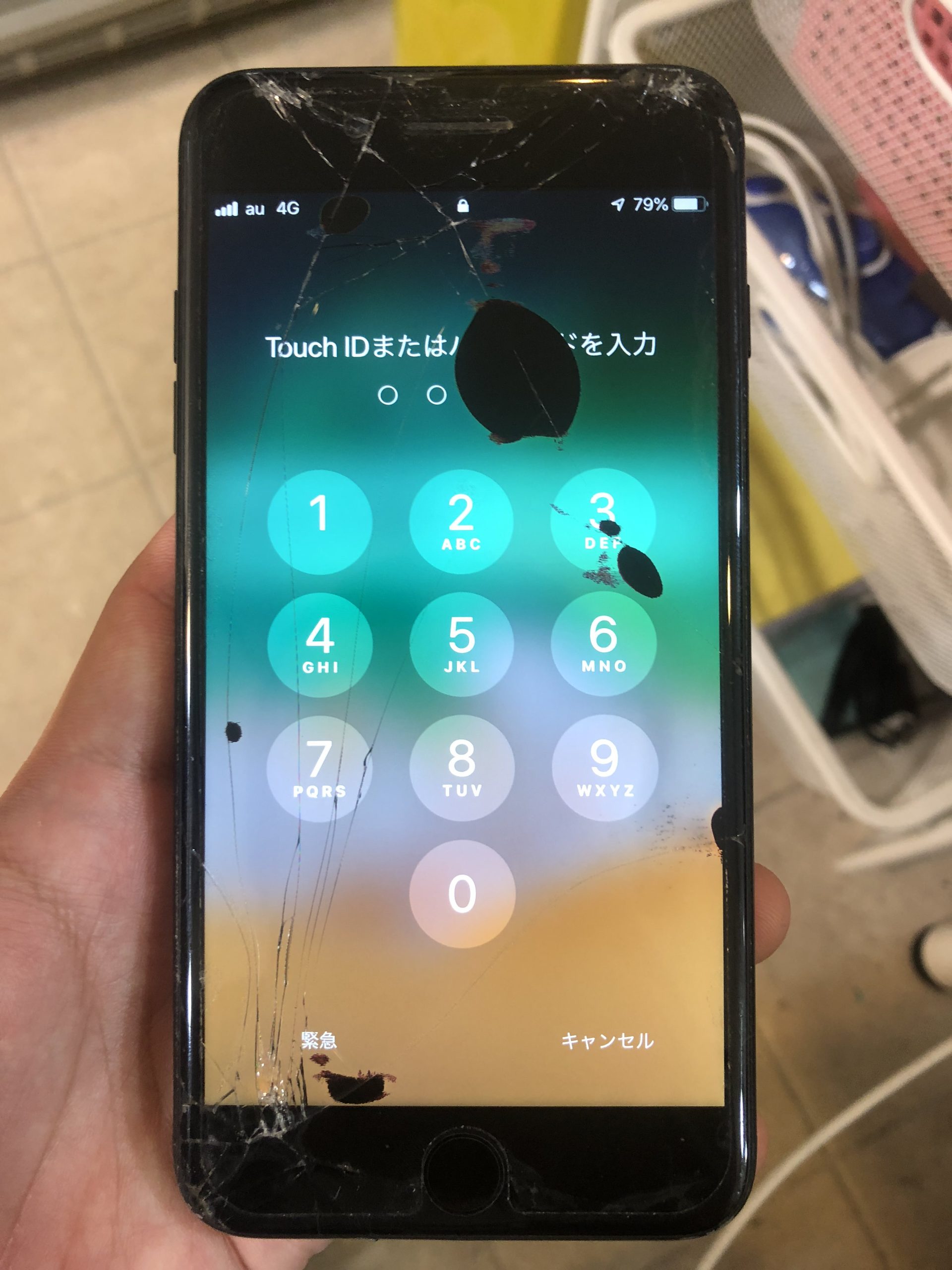 iphone 黒い 丸