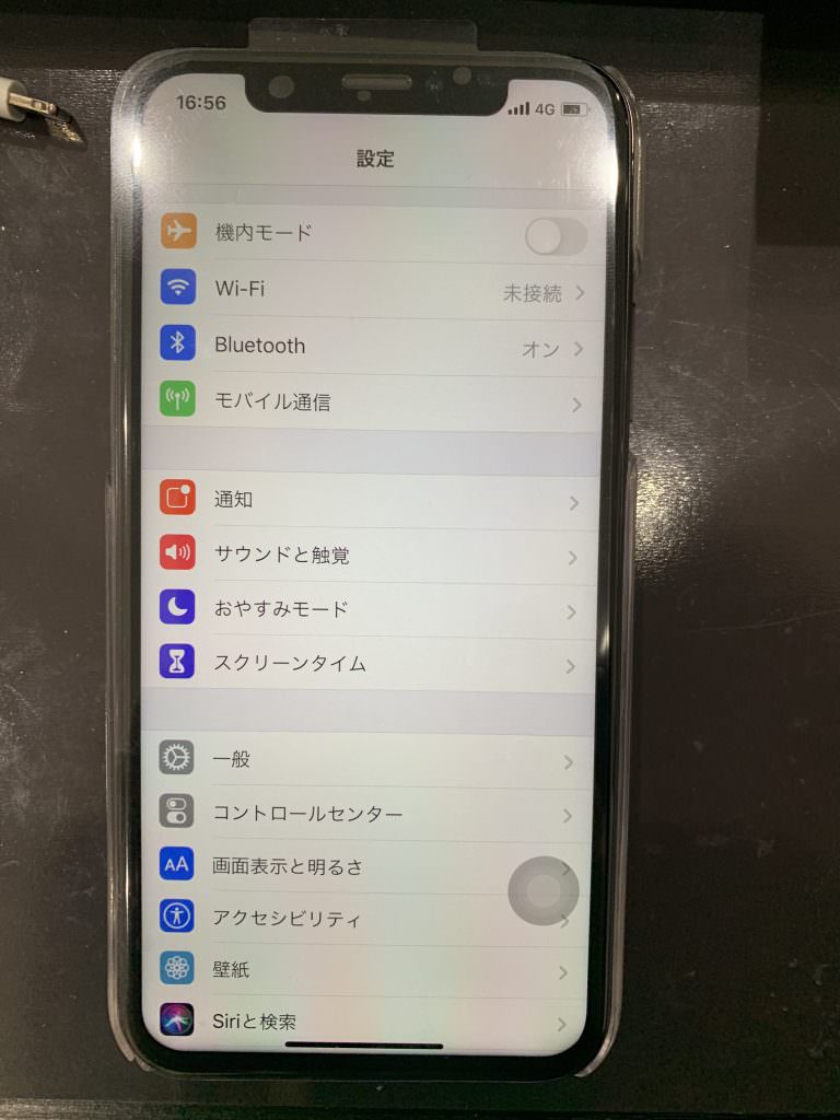 iPhoneX 画面 光る