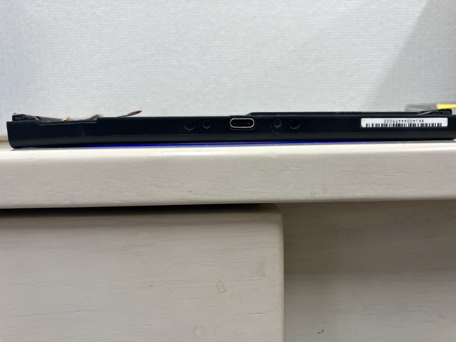 本体が大きく反っているNintendo Switchのブルースクリーン修理端末